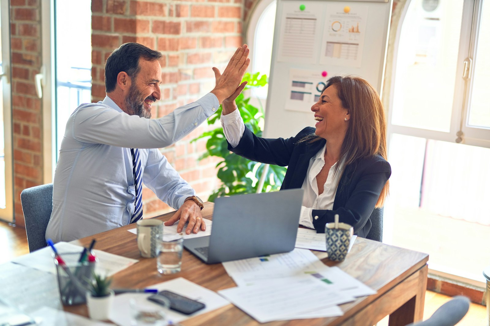 Client and strategist reviewing a media brief